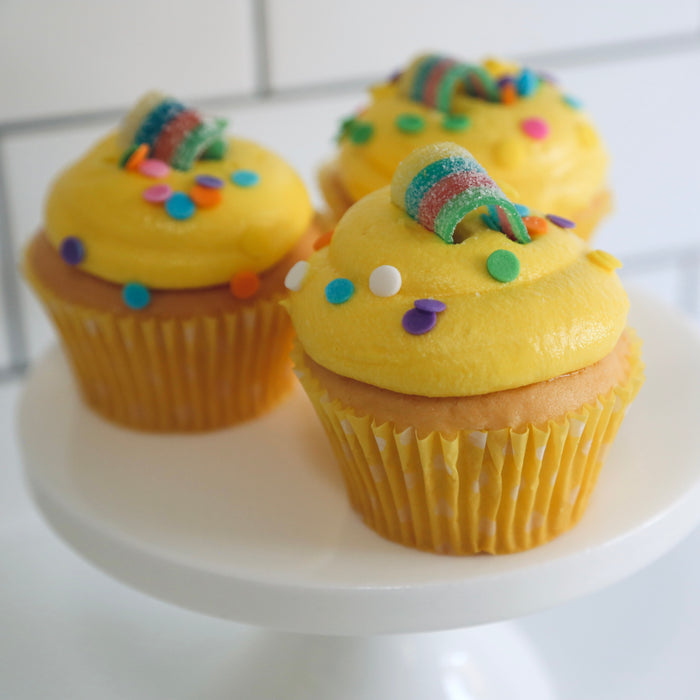 6 Vanilla Cupcakes with Yellow Icing